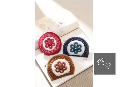 ▲中國結做成的小錢包。