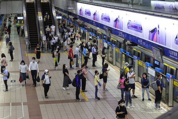 Reduced number of commuters are seen during the morning rush hour in Taipei on Monday.